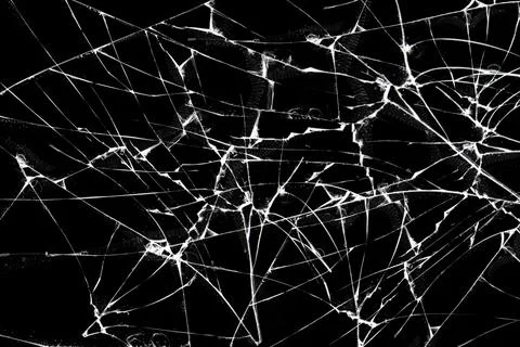 The effect of broken glass screen smartphone, cracked on a black background. Stock Photos
