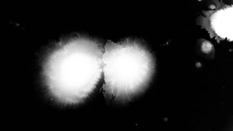 The effect of a drop of ink on a black background 1920x1080 Stock Footage 107558743