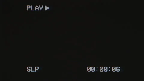 Effect of Glitch TV on black background with text 'PLAY' and timecode Video stock 254856510