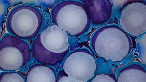 The effect of ink in water. The spreading white circles are constantly moving Stock Footage 162817983