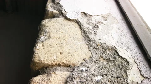 Effect of an old tuff wall that is about to break Stock Footage 195443515