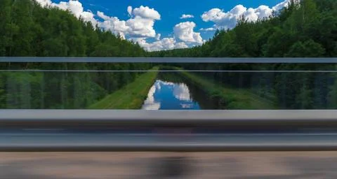 The effect of speed on the road and blurred objects. Roadside view and landscape Stock Photos