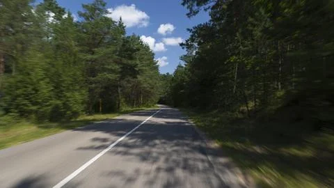 The effect of speed on the road and blurred objects. View of the road Stock-Fotos