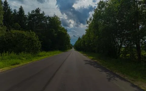 The effect of speed on the road and blurred objects. View of the road. 스톡 사진