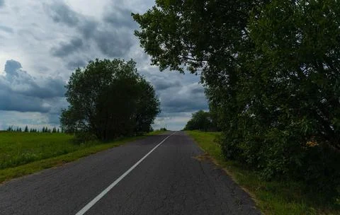 The effect of speed on the road and blurred objects. View of the road. 스톡 사진