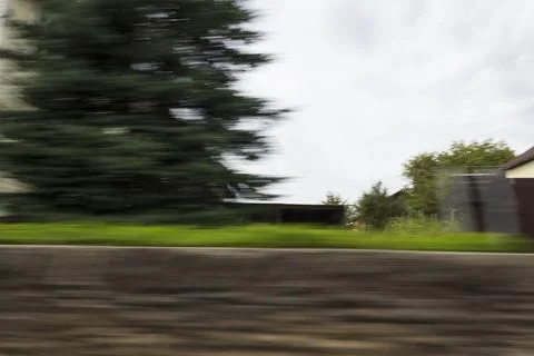 The effect of speed on the road. View of the road on a sunny summer day. Stock Photos