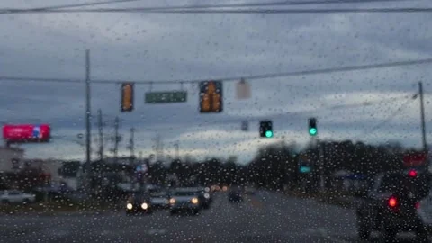 Effect traffic lights and rain through the windshield shaky on purpose Stock Footage 149538454