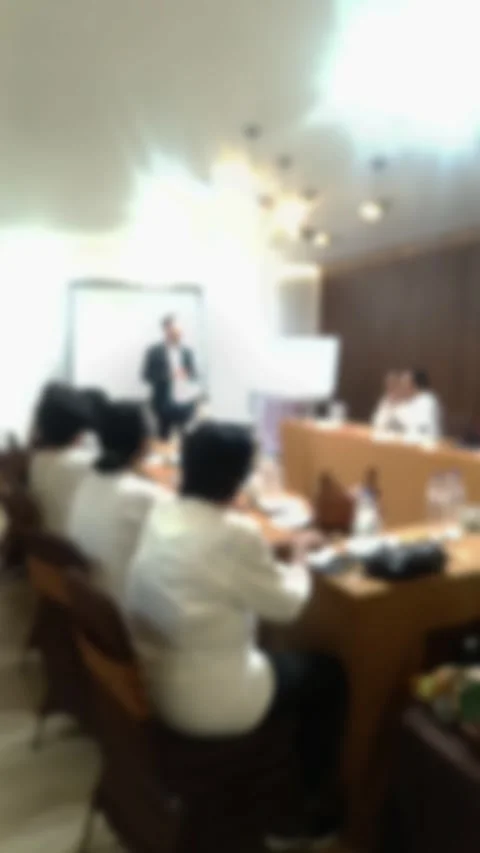 Effect video of Group people in a meeting, discussing ideas around a conference Stock Footage 340533740