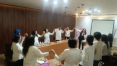 Effect view of A group people in a circle holding hands, participating in a team Stock Footage 340533733
