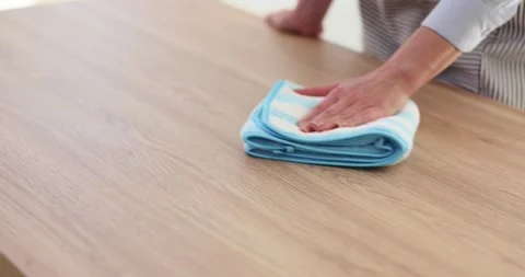 Effective cleaning of the table with a microfiber cloth Stock Footage 271222679