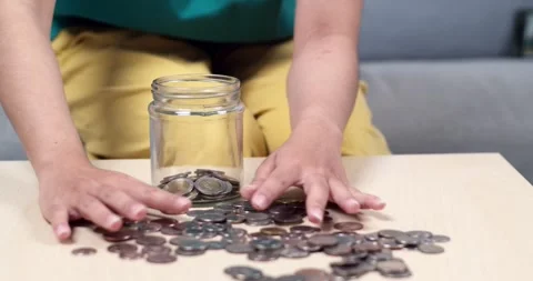 Effective coin counting visual steps for personal finance in your home workspace Stock Footage 334327715