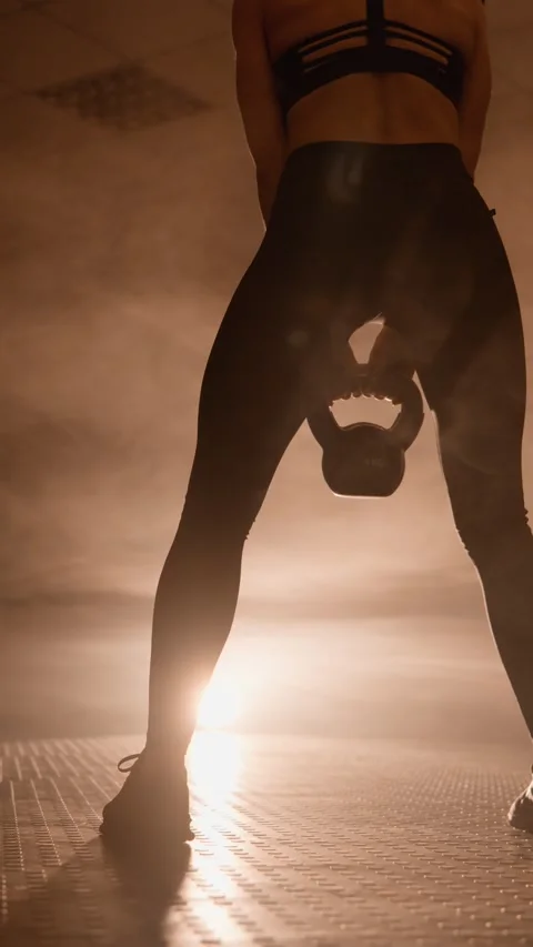 Effective kettlebell exercises to improve strength and cardiovascular Stock Footage 268265574