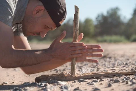 Effective method for starting a fire in the wilderness with limited resources Stock Photos
