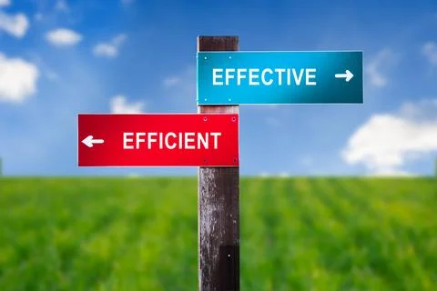 Effective versus Efficient - Road sign with two options. Stock Photos