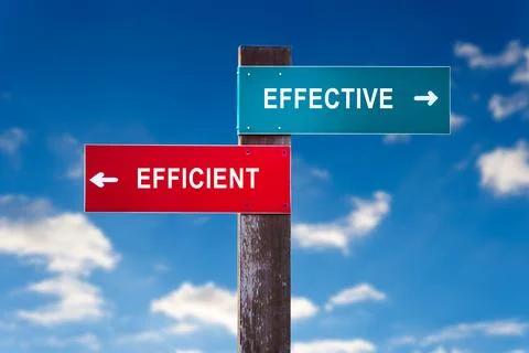 Effective vs Efficient - Traffic sign with two options. Stock Photos