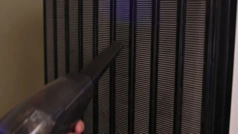 Effectively cleaning an refrigerator Unit using a vacuum is essential for Stock Footage 312647613