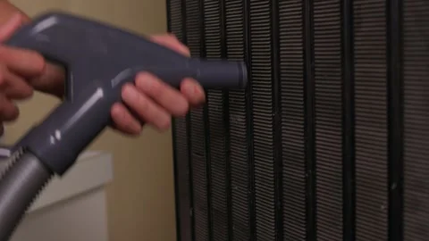 Effectively cleaning an refrigerator Unit using a vacuum is essential for Stock Footage 312647652