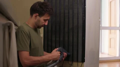 Effectively cleaning an refrigerator Unit using a vacuum is essential for Stock Footage 312647956