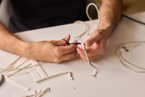 Effectively Organizing and Skillfully Managing Tech Cables for a Neater and Tidy Stock Photos