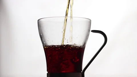 Effects of boiling punch in a glass cup Video stock 87234405