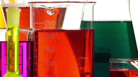 Effervescence in a beaker filled with red liquid Video stock 64287534