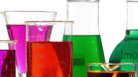 Effervescence in a beaker filled with red liquid Video stock 64292832