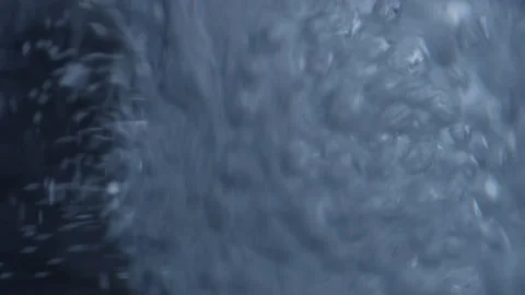 Effervescent air bubbles shake and move in the water at high speed Stock Footage 229752931