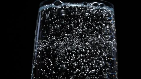 Effervescent Bubbles in Sparkling Drink, Dynamic Motion on Dark Backdrop Stock Footage 299277745