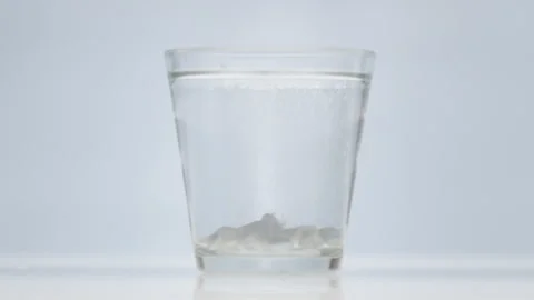 Effervescent Ceramics Veneers Model Falling And Bubble In A Glass Of Water Stock Footage 258208160