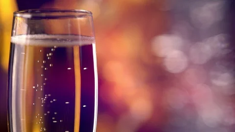 Effervescent flute of bubbling champagne Stock Footage 117349442