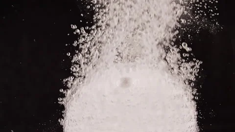 Effervescent tablet aspirin. Pill falling down in water on black background. The Stock Footage 164675761