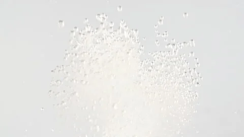 Effervescent tablet aspirin. Pill falling down in water on white background. The Stock Footage 165618749