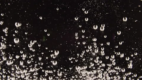 Effervescent tablet aspirin. Pill falling down in water on black background. The Stock Footage 166154943