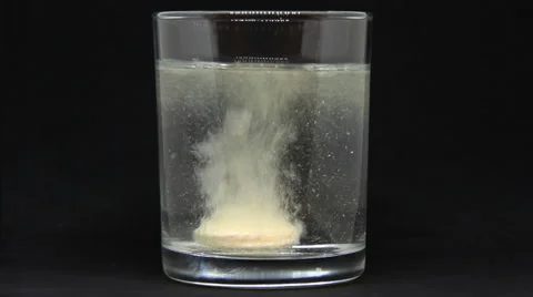 Effervescent Tablet With Bubbles In A Glass Of Water, Vitamin C Stock Footage 69057800