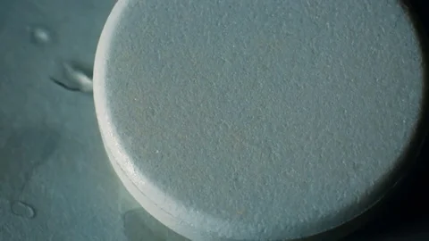 The effervescent tablet is dissolved in water Stock-Footage 70639793