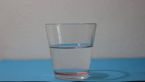 Effervescent tablet dissolves in bubbles filled with water  Stock Footage 102878243