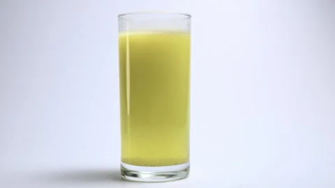 Effervescent tablet dissolves in a glass of water time lapse Stock Footage 155900597