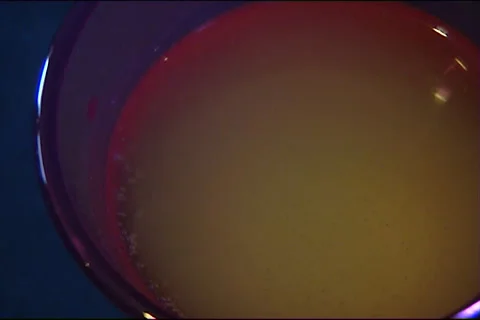 Effervescent tablet dissolves in a water Stock-Footage 53561443