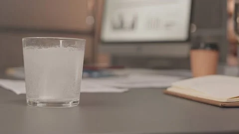 Effervescent Tablet Dissolving in Glass of Water Vidéo 172039754