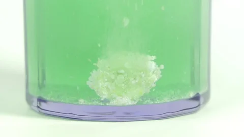Effervescent tablet dissolving in water. Stock Footage 79113641