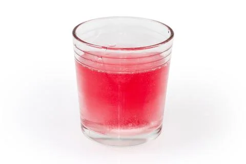 Effervescent tablet during dissolution in glass of water Stock Photos