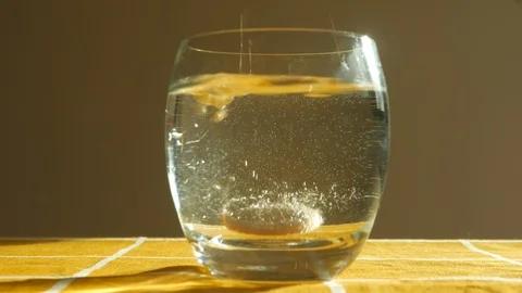 Effervescent tablet in a glass. Stock Footage 105107288