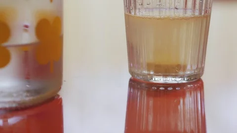 Effervescent tablet in a glass of water Stock Footage 123233379