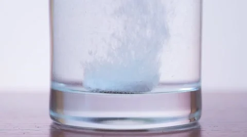 The Effervescent Tablet in Water. Slow Motion Stock-Footage 67049767
