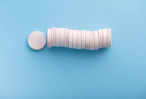 Effervescent tablets on blue Stock Photos