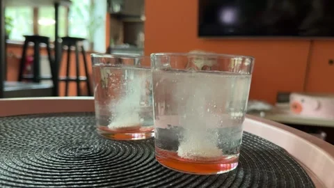 Effervescent Tablets Dissolving in Glass of Water Stock-Footage 314565439
