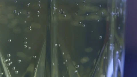 Effervescent tablets fall into a glass of water Stock Footage 83682512
