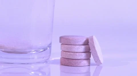 Effervescent Tablets in Glass with Watter Stock Footage 67432278