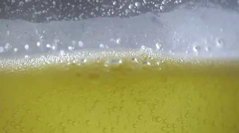 Effervescent vitamin C tablet bubbles in glass of water. Pill in slow motion Stock Footage 68721167