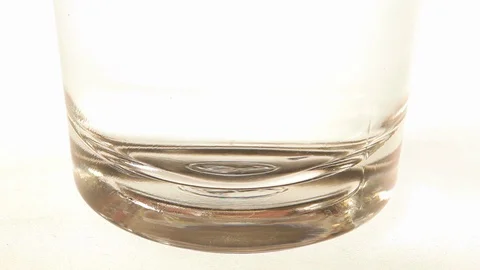 Effervescent vitamin C tablet bubbles in glass of water. Stock Footage 100932052